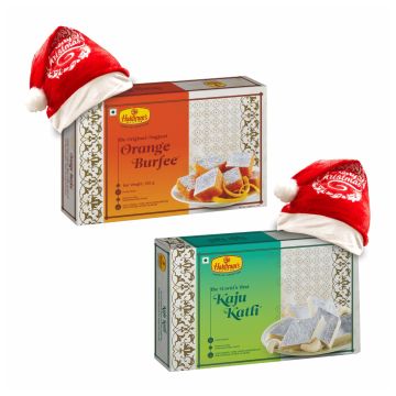 Kaju Katli (500 g) and Orange Burfee (500 g) with 2 Christmas Cap